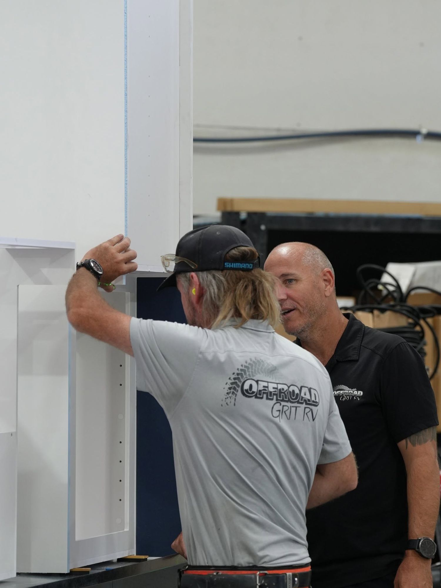 Talking through a wall panel