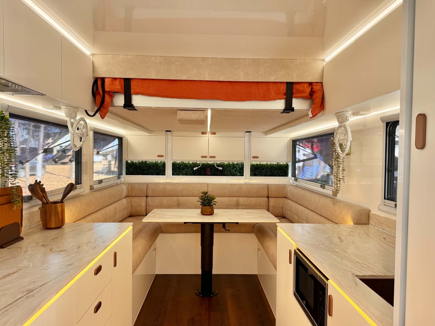 Dinette with drop-down bed above