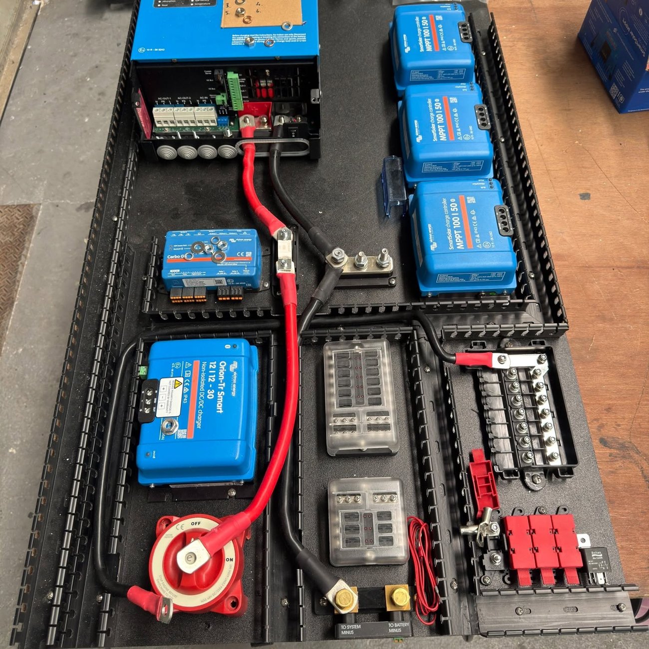 An electrical board being built on the bench in our factory