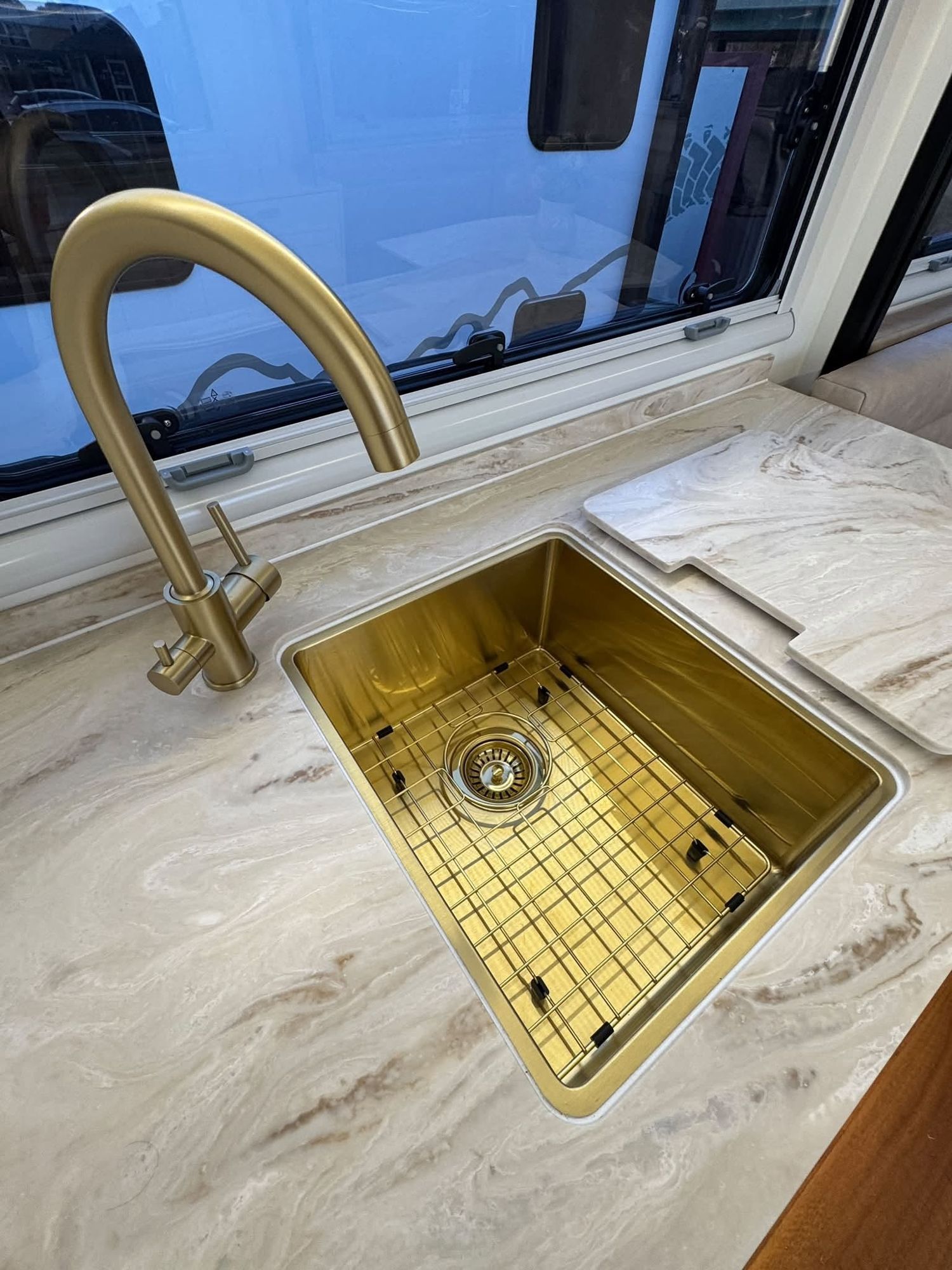 Brushed brass over a gold sink