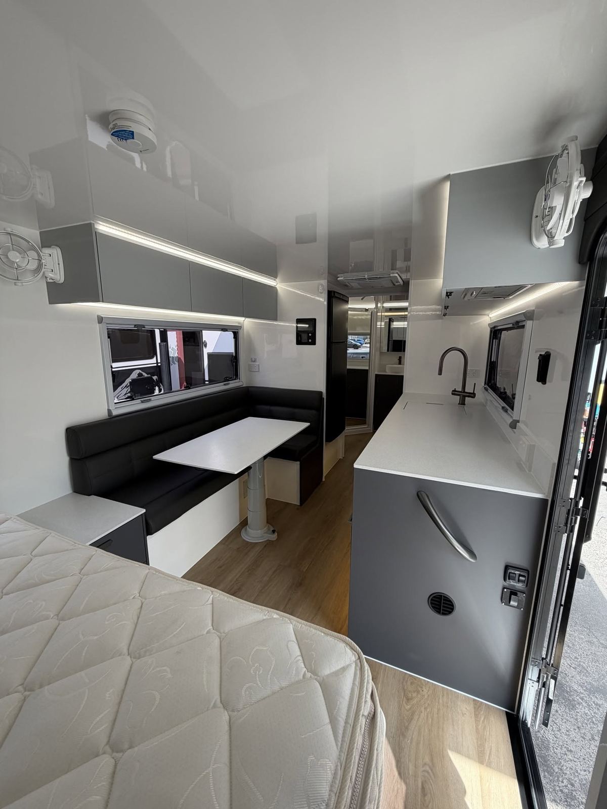 Grey cabinetry and black tapware