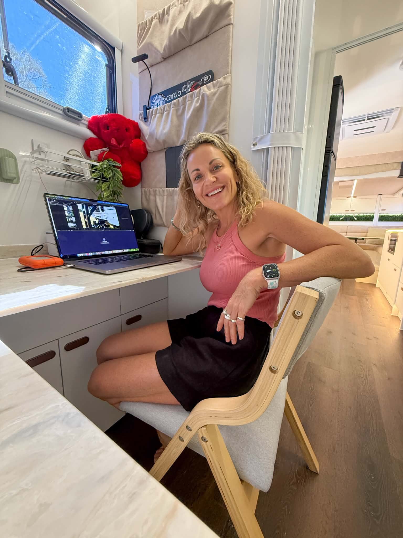 Miriam at her desk, working on the road