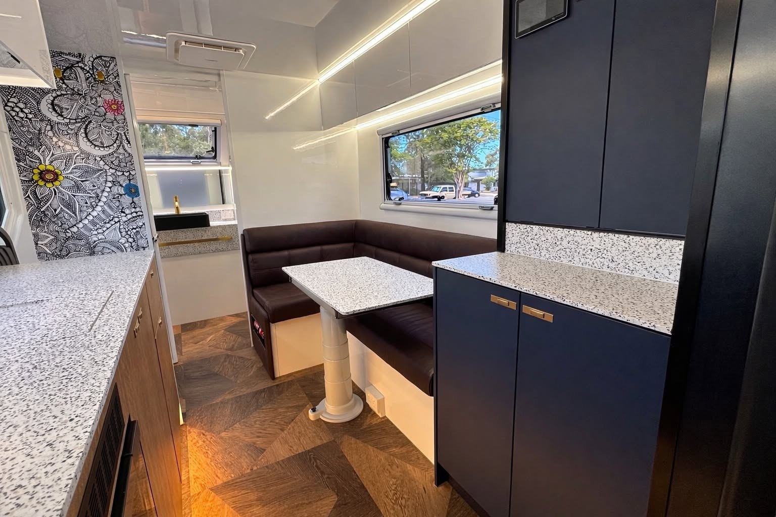 Navy cabinetry and stone benchtop