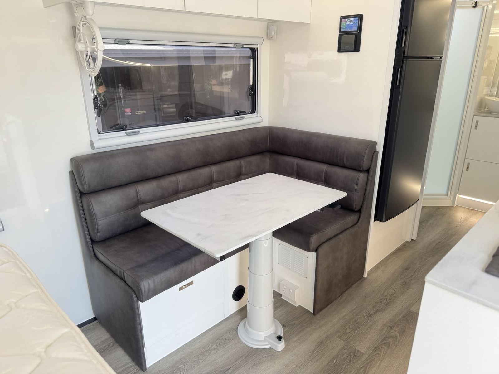 Grey dinette and full-height fridge