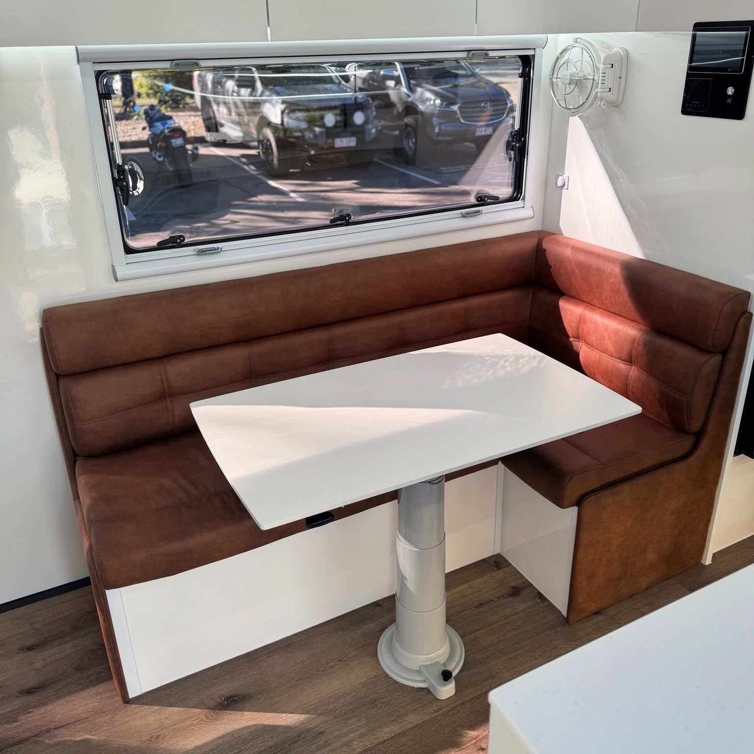 Rust leather U-shaped dinette