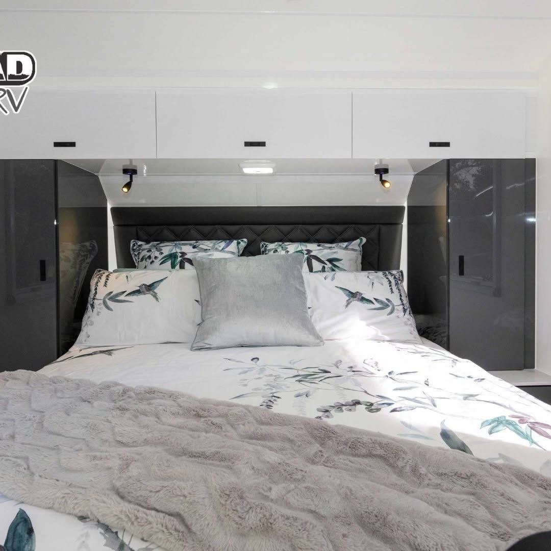 Bedroom with dark wardrobes