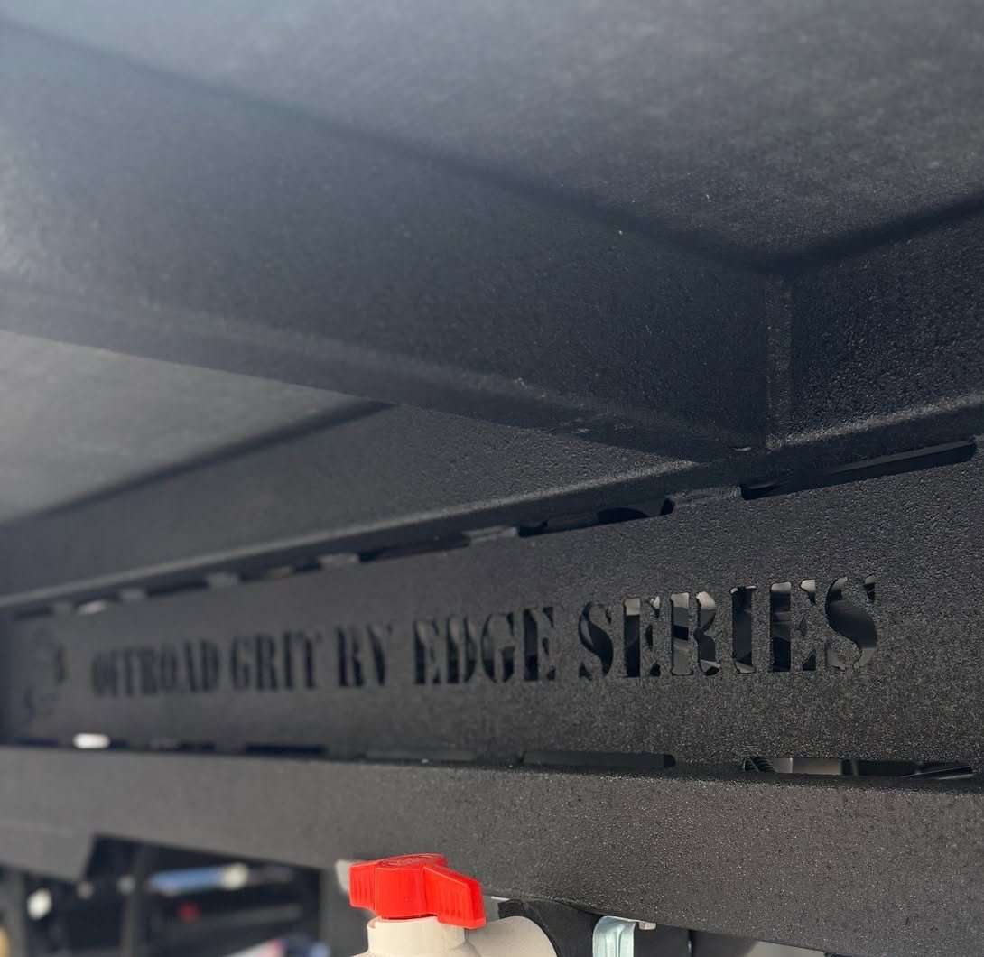 An Edge LTC chassis rail with the Offroad Grit RV Edge Series name cut through it