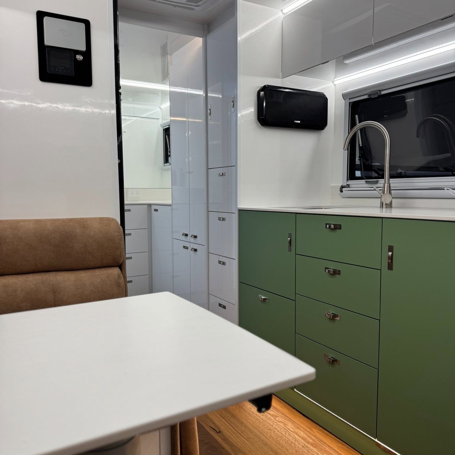 Green kitchen with pantry