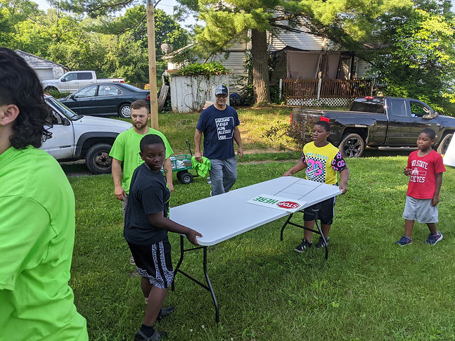 youngmenhelping.jpeg