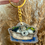 Thumbnail: Hand illustrated transparent fox terrier in his basket and heart keychain
