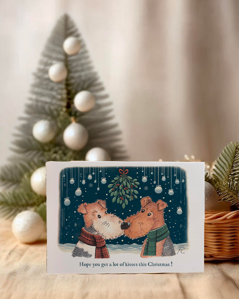 Kissing under the mistletoe fox and welsh/airedale terrier greeting card