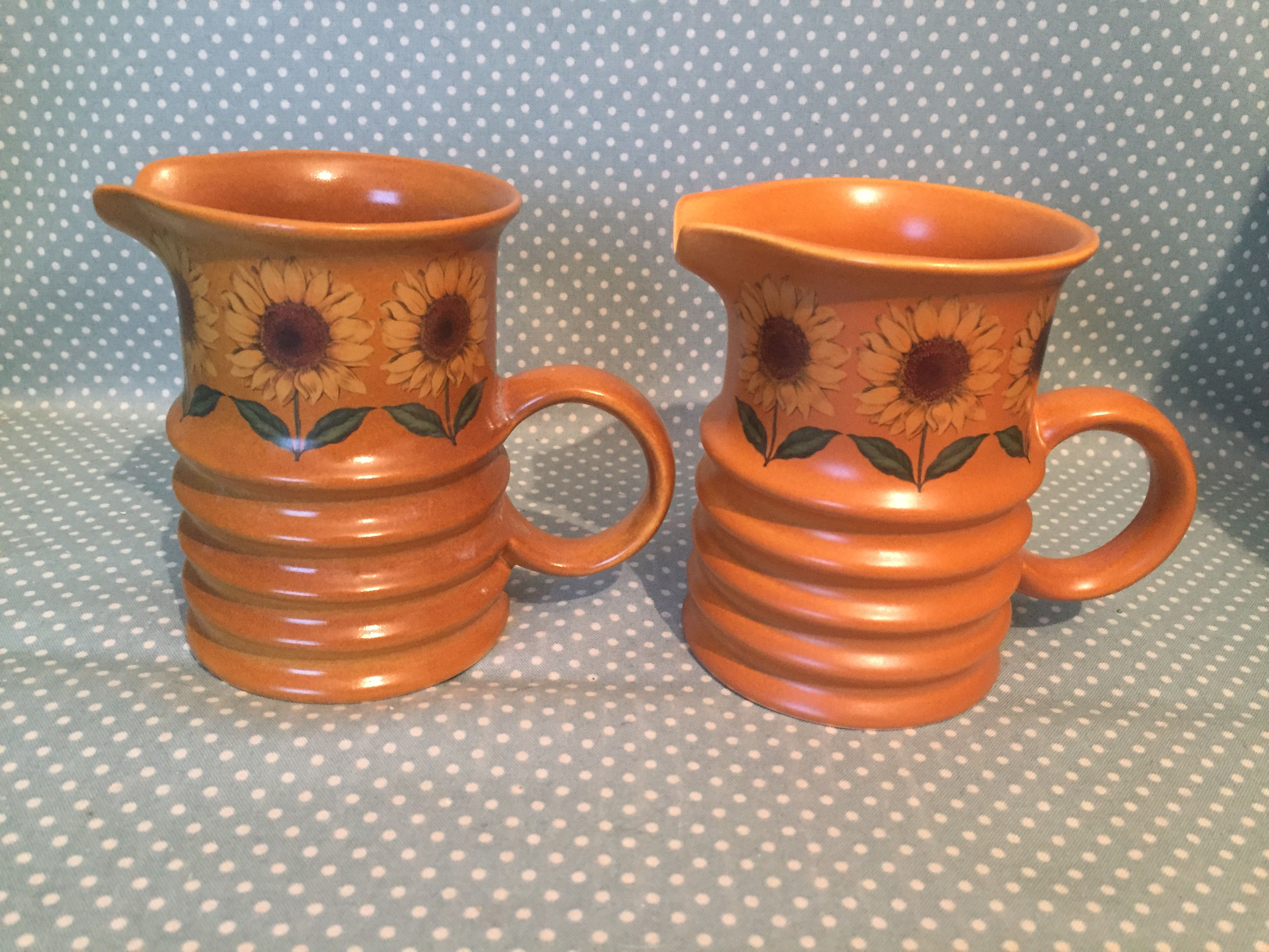 2 Carlton Ware Sunflowers design creamers.