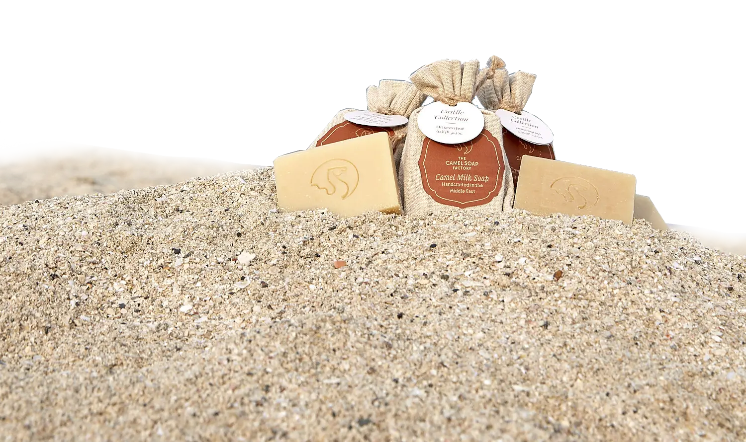 The-Camel-Soap-Factory-Bagged-Castile-bars-on-beach-sand