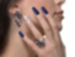 woman-with-nail-art-promoting-design-luxury-earrings-ring.jpg