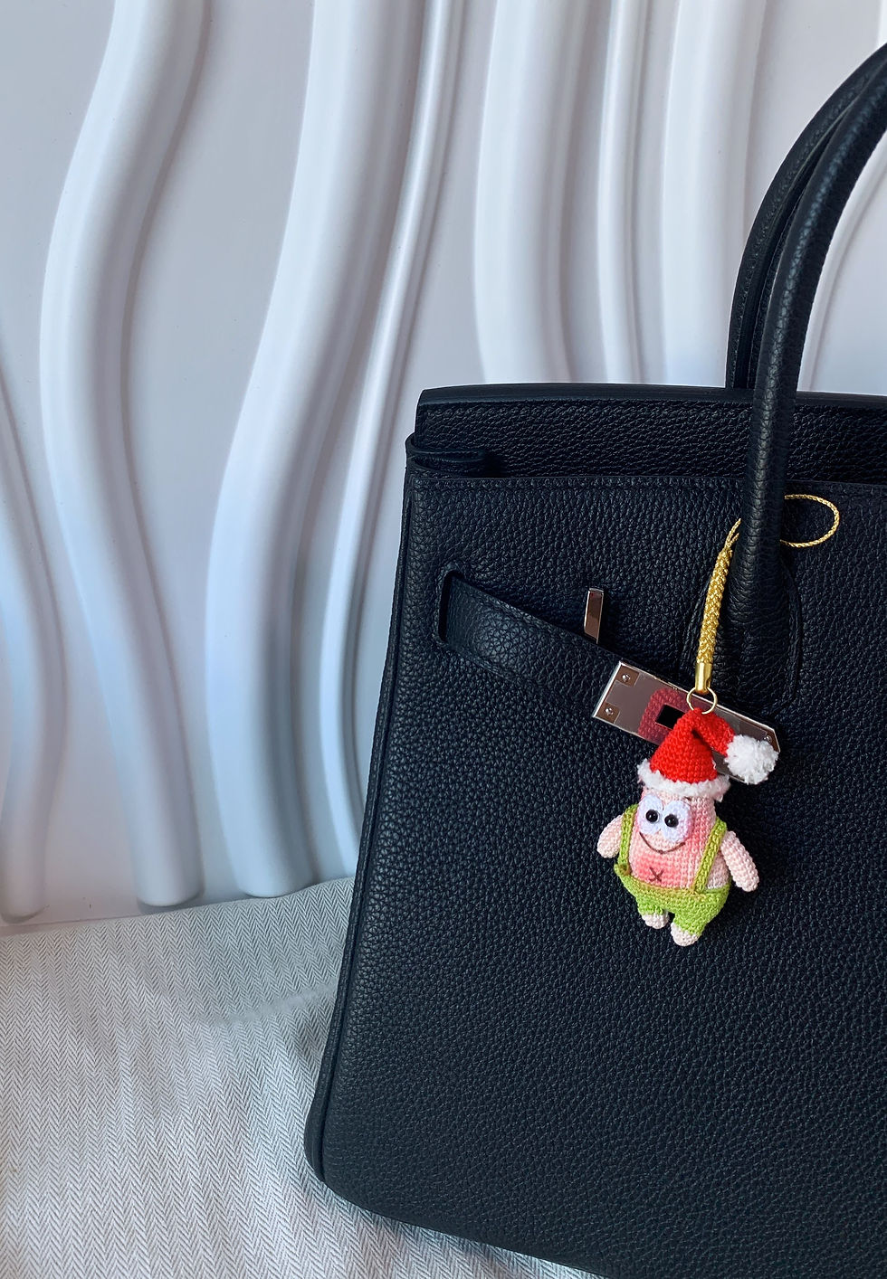 Thumbnail: Fine-Kniiting Patrick pendant