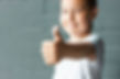 cute-boy-8-years-old-showing-thumbs-up-on-backgrou-2024-10-18-07-58-23-utc.jpg