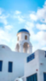 A white building with blue dome