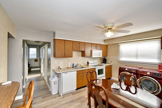 Full kitchen features range, oven, microwave, dishwasher, full-size refrigerator, Keurig