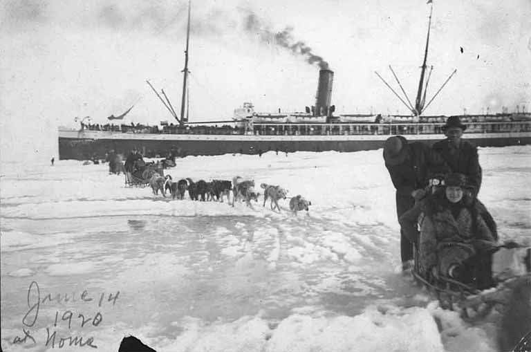 A cargo ship lies at anchor near Nome