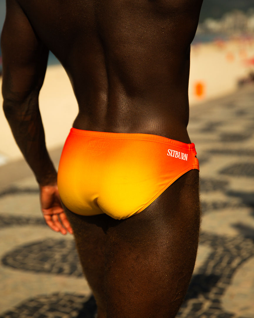 Sltburn gradient orange and yellow swim brief named Sunset photographed from behind.