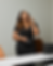 Latisha Scott in black dress on the phone