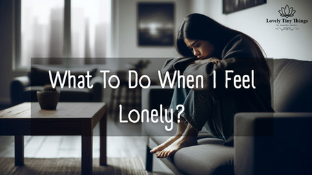A woman sits on a couch, head on knees, looking contemplative. Text reads "What To Do When I Feel Lonely?" in a dimly lit room.
