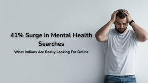 Man in distress holding head, wearing a white t-shirt. Text: "41% Surge in Mental Health Searches. What Indians Are Really Looking For Online."