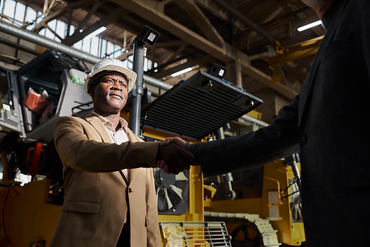 businessman-greeting-the-partner-at-factory-2023-11-27-05-16-11-utc-2048x1367.png