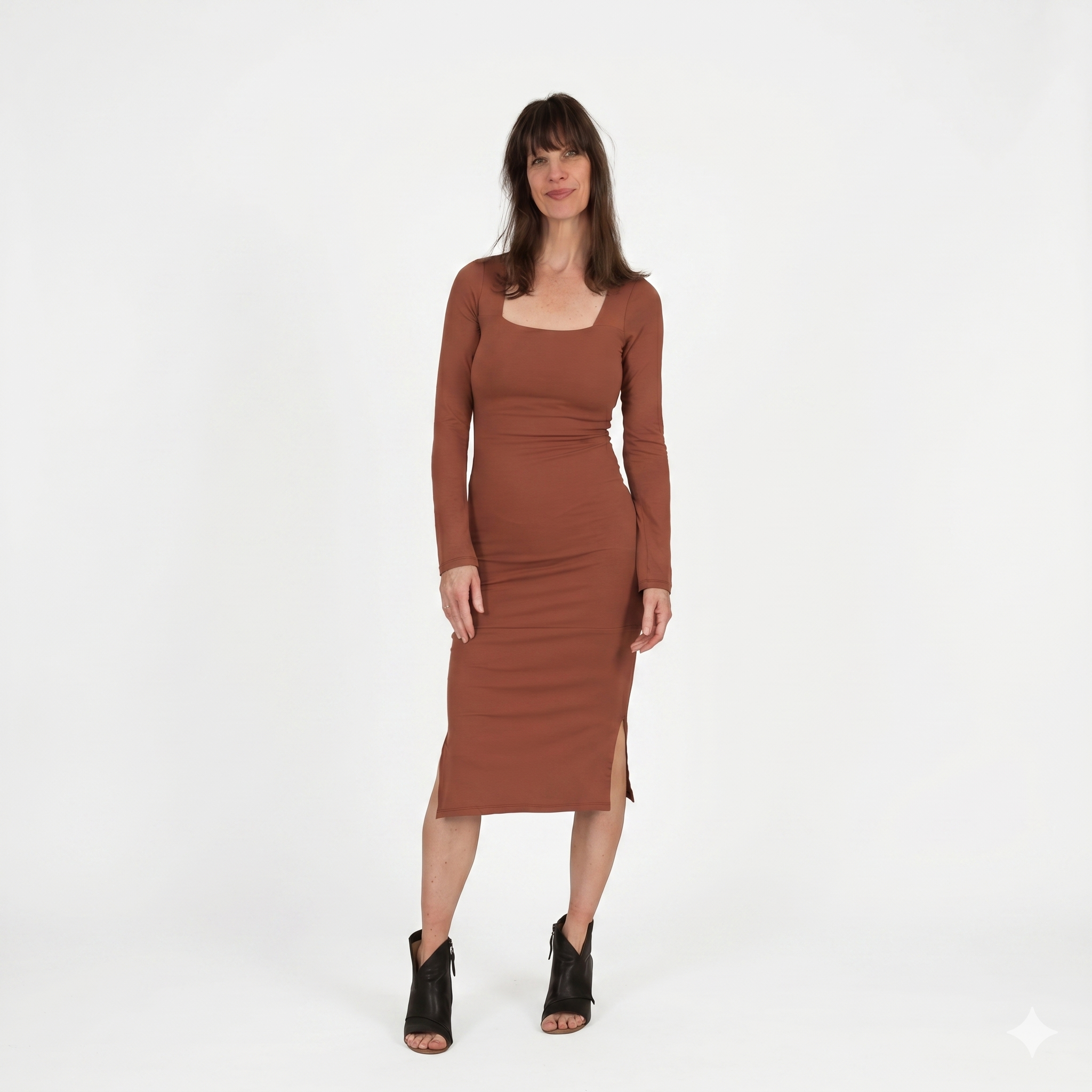 Long-sleeve June dress in Rust bamboo jersey, featuring a modern square neckline, fitted silhouette, and midi-length hem with