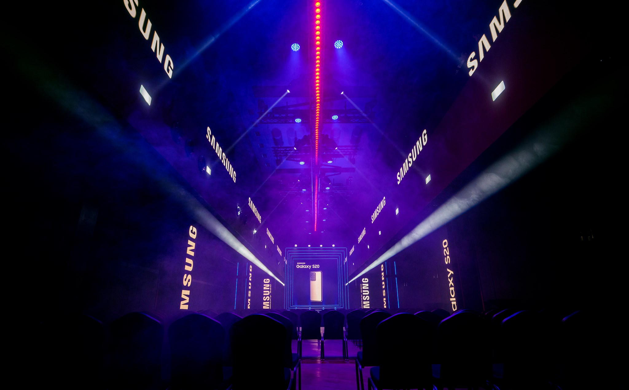 Samsung launch stage illuminated in violet and blue.