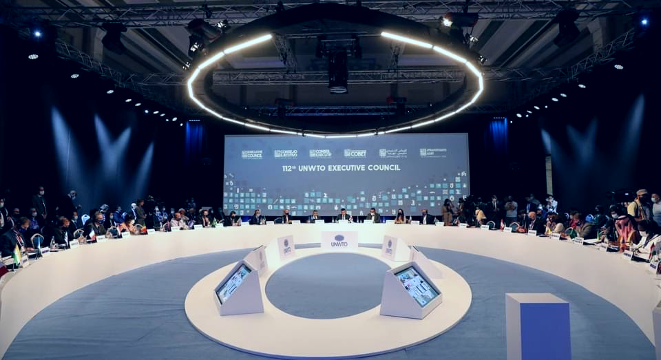 Circular meeting layout and overhead lighting at the UNWTO council.