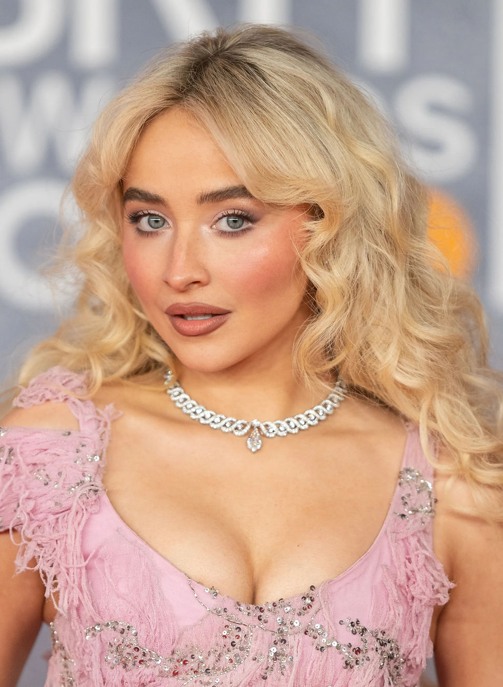 Sabrina Carpenter pop artist portrait with vinyl albums