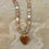 Thumbnail: Tamara swirl necklace w/ heart