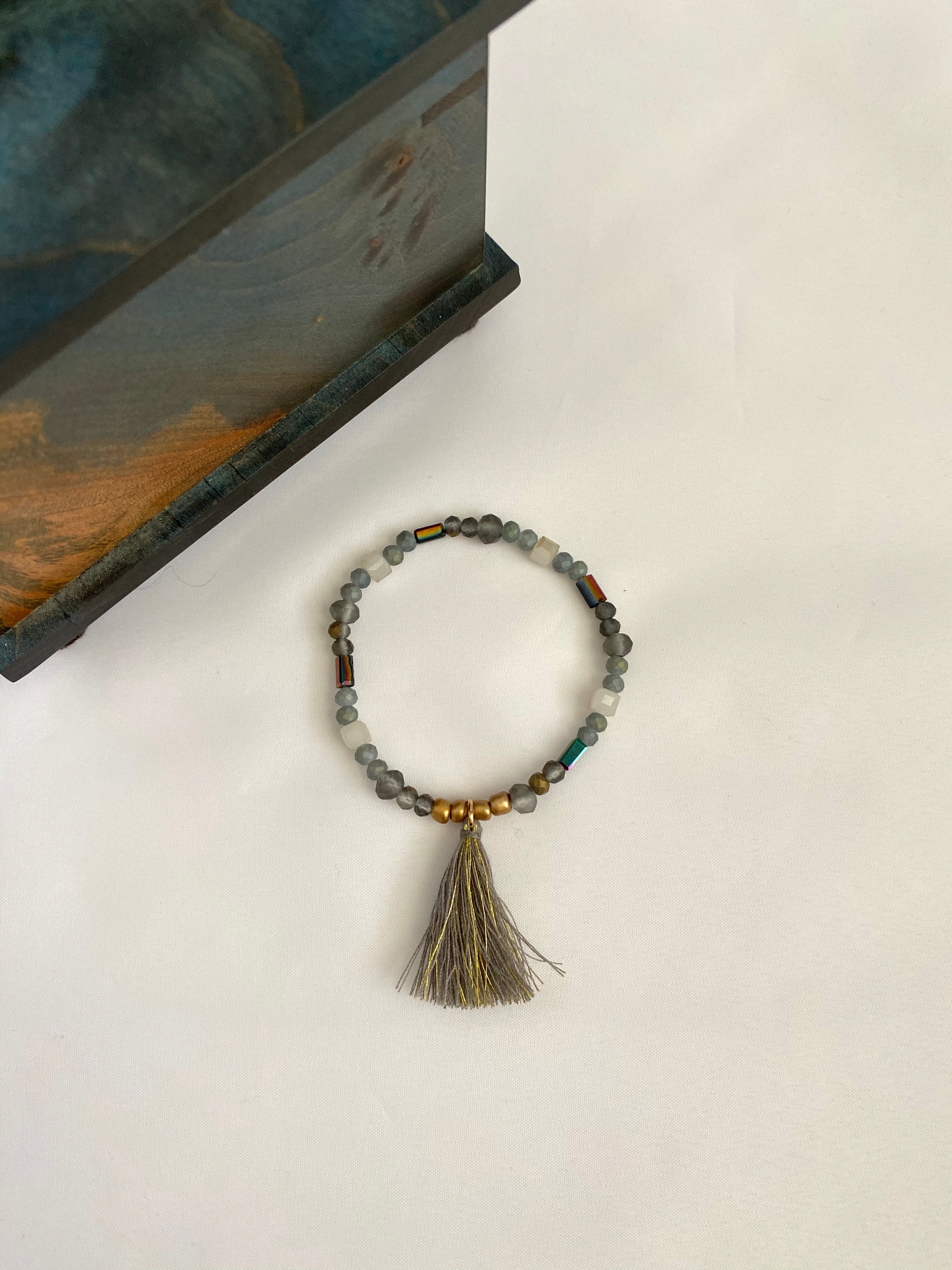 Glass beads and tassel bracelet