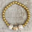 Thumbnail: White and gold clay with gold glass bracelet