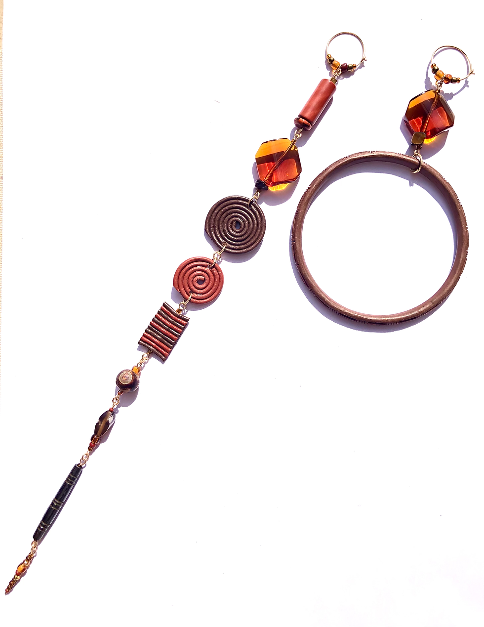 Thumbnail: caramel coated dark chocolate leather and cinnabar earrings