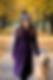 Woman wearing Moonberry crochet beret purple striped crochet hat walking dog in autumn park