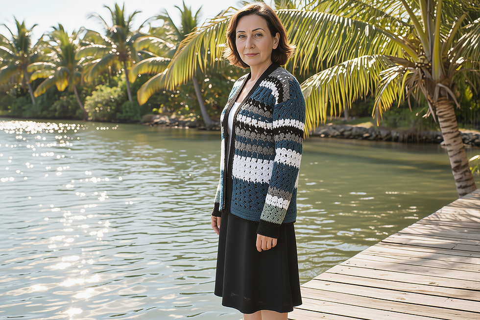 Ocean Tide handmade crochet cardigan worn beside a tropical lagoon