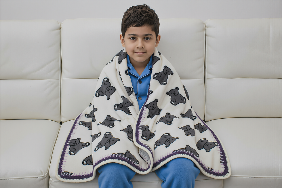 Boy wrapped in Twilight Bear polar fleece baby blanket with hand-crocheted border