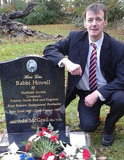Steve next to headstone