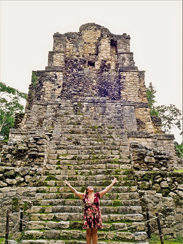 A woman in the Maya ruins of Muyil