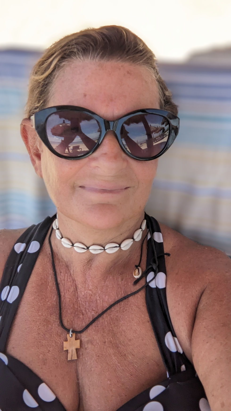 Me on a Mexican beach wearing my amulet.