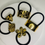 Thumbnail: Daisy gold hair ties