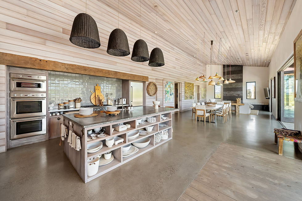 Modern farmhouse kitchen with woven pendant lights, an open-shelf island, and a plank ceiling