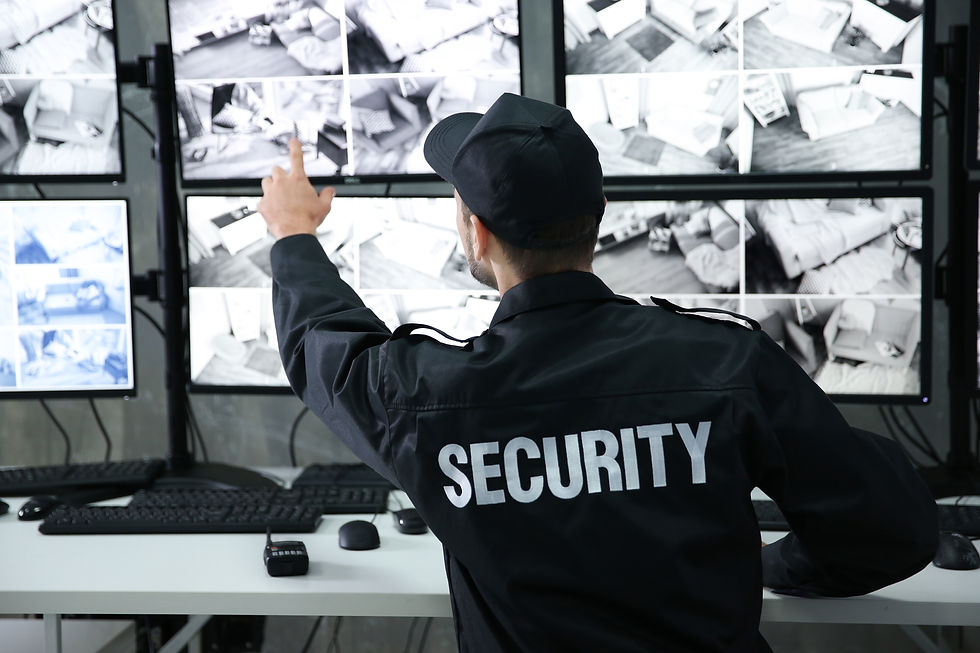male-security-guard-working-surveillance-room.jpg