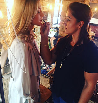 Preeti applying makeup