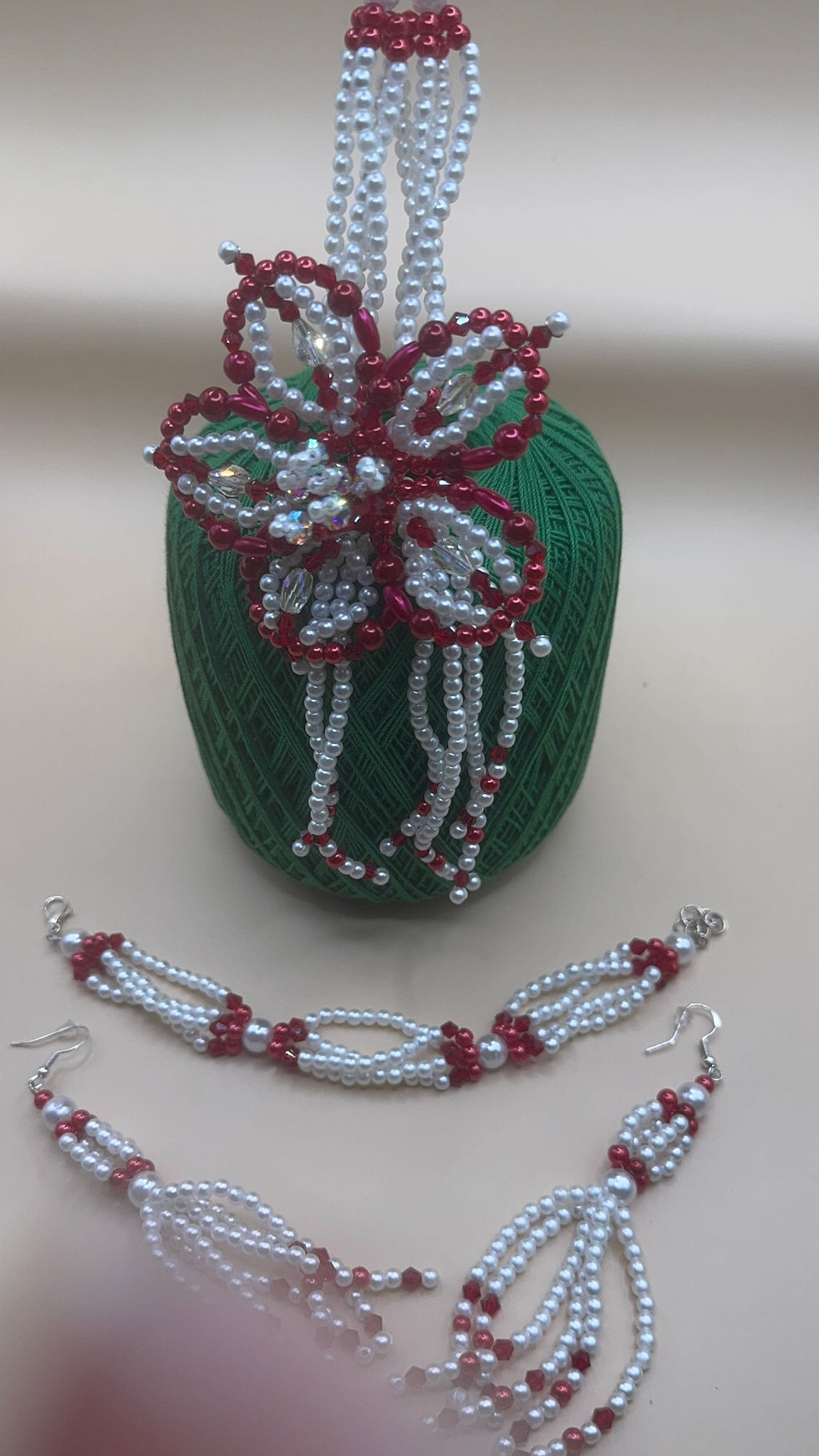 Thumbnail: A white & red beaded necklace set - necklace, earrings, bracelet
