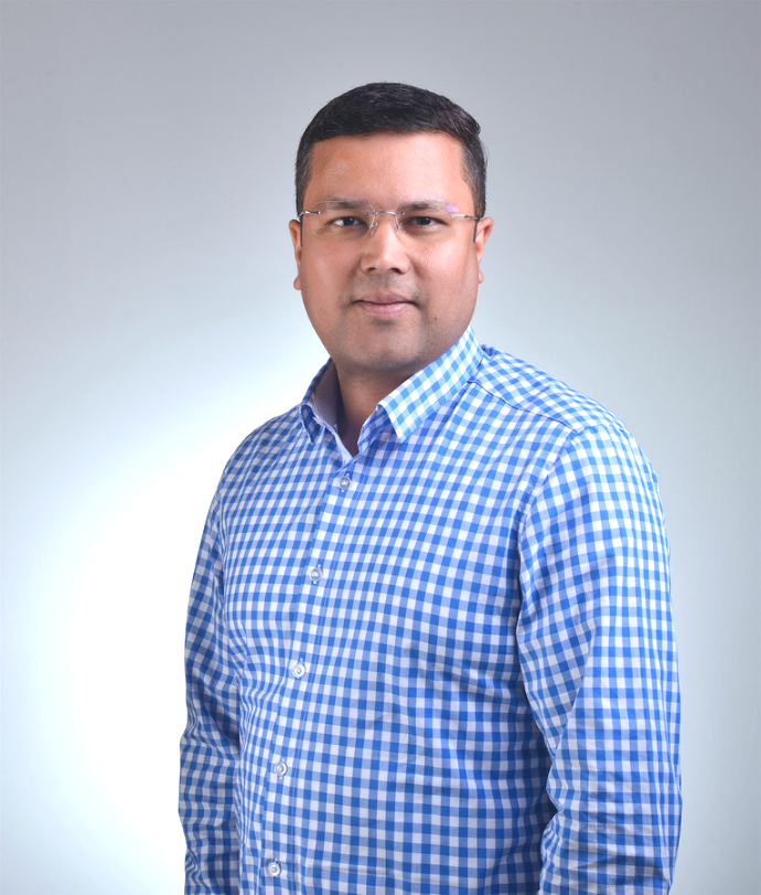 Portrait photograph of a man in business attire