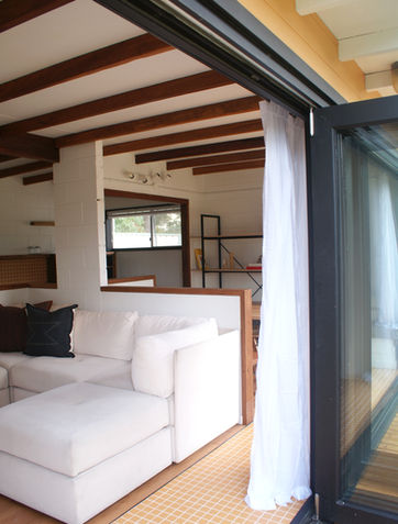 Open plan living room with wide bi-fold doors