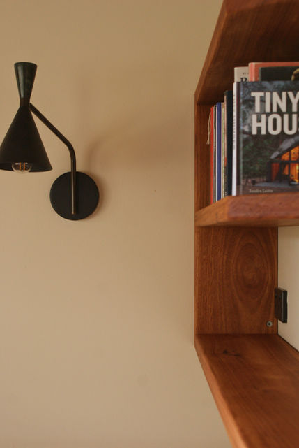 Custom reading nook and shelves using recycled hardwood